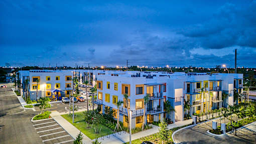 Front view of Gateway Luxury Apartments featuring contemporary design and well-maintained landscaping.