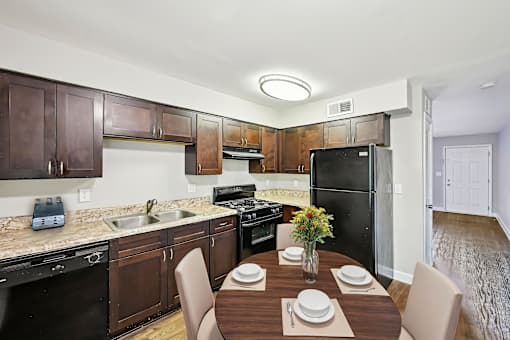 Kitchen with black appliances in affordable two bedroom apartment in Marietta Georgia