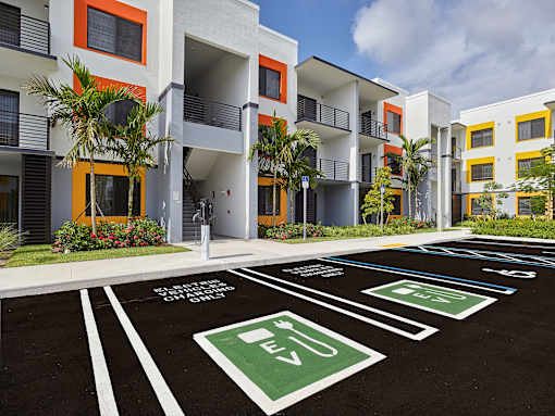 Eco-friendly EV charging stations at Gateway Luxury Apartments in Pompano Beach, offering convenient electric vehicle charging for residents.