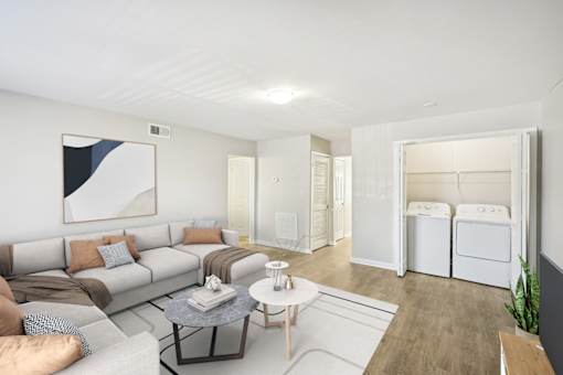 Spacious living room in affordable Marietta apartment with wood-style flooring and open layout