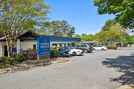 Entrance sign for Amber Grove Apartments, an affordable community in Marietta Georgia
