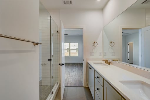 Luxury Four Bedroom Townhomes in Avondale Estates, GA - Henley Avondale –bathroom with a large sink and a shower