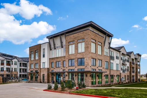 a picture of a building with a blue sky in the background