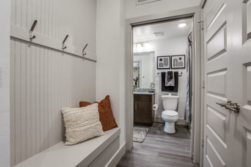 a bathroom with a toilet and a sink