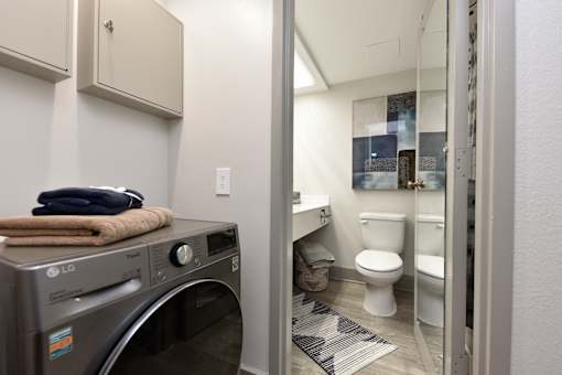A laundry room with a washer and dryer.