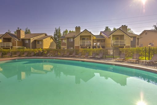 Apartments for Rent in Beaverton, OR - MonteVista - Sparkling Pool with Lounge Seating, Grilling Area, Fire Pit, and Greenery