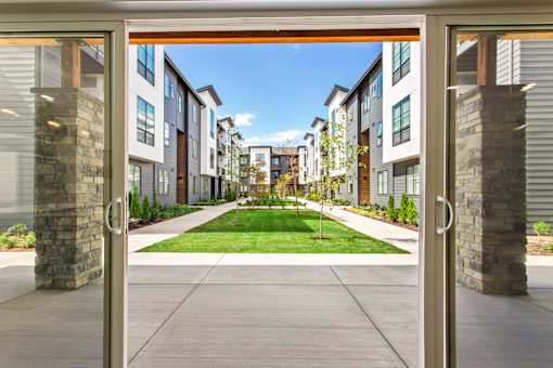 A view of a residential area through a doorway.