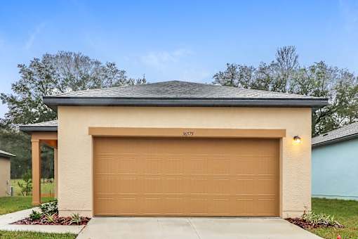 A garage with the number 86572 on it.