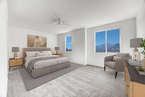 a bedroom with a bed and a chair and a window