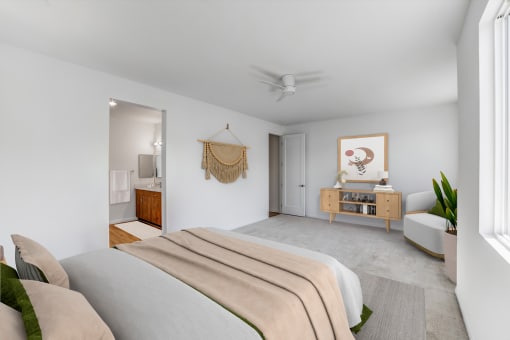 a bedroom with a bed and a dresser