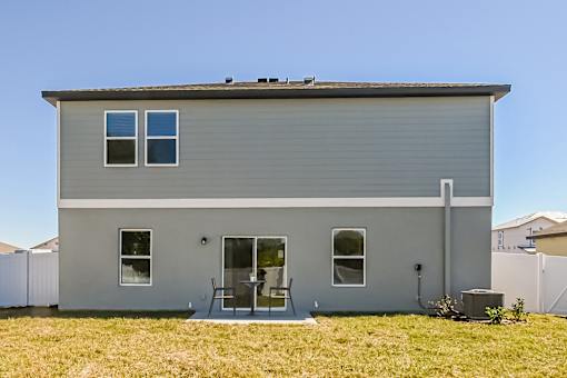 Ruskin, FL Homes - Ruskin Reserves Luxury New Home with Large Driveway and Attached Garage and Spacious Backyard