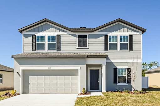 Ruskin, FL Homes - Ruskin Reserves Luxury New Home with Large Driveway and Attached Garage and Spacious Backyard