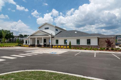 Exterior view of Blue Sky Landing apartments in College Park, GA featuring modern community architecture near Old National Parkway, Camp Creek and Hartsfield-Jackson Atlanta International Airport.