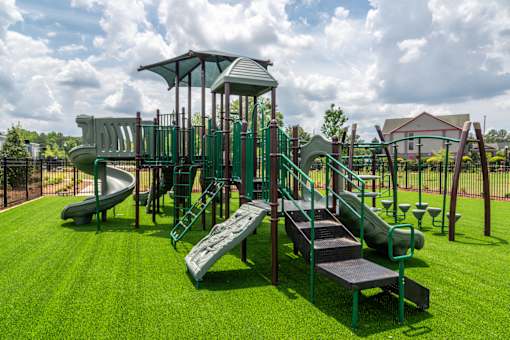Community playground at Blue Sky Landing apartments in College Park, GA providing outdoor recreation near Old National Highway, South Fulton and East Point.