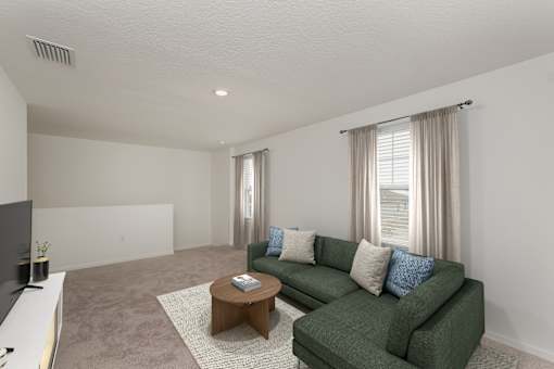 Pet Friendly Homes in Ruskin, FL - Ruskin Reserve - Upstairs Living Room Area with large windows
