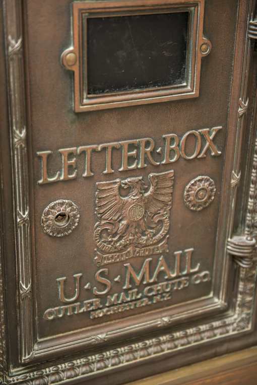 A close up of a letterbox with the words "Letterbox" and "U.S. Mail" on it.