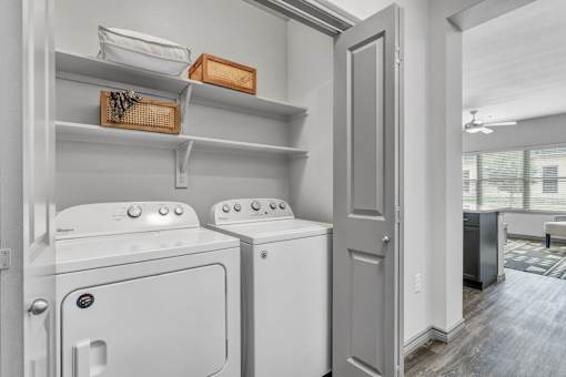 A laundry room with a washer and dryer.