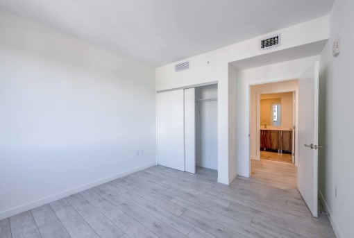 Countyline Apartments in Miami FL photo of  bedroom with hardwood flooring