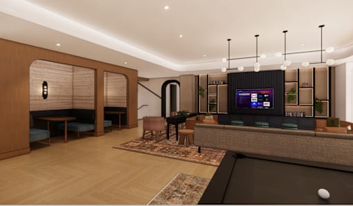 A modern living room with a pool table and a television.