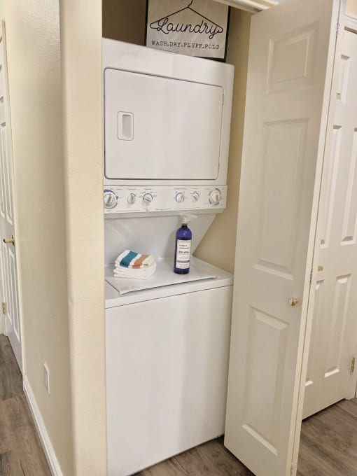 Two-Bedroom Apartments in Spokane, WA - Deer Creek - Laundry Closet with Stacked Washer and Dryer.