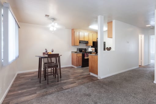 1 BR Apartments in Martinez CA - Mission Pines - Dining Area with Wood-Style Flooring Next to the Kitchen