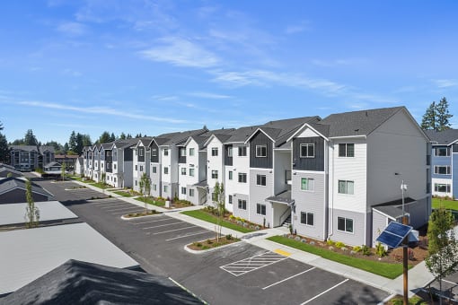 exterior view of a row of apartment buildings,