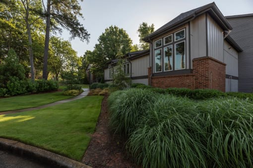 Pet-Friendly Apartments in Lawrenceville– Park on Sweetwater – the side of our apartments with a lawn and a sidewalk