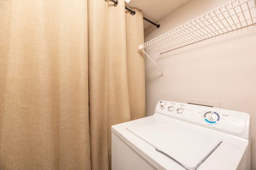 Two-BR Apartments In Lawrenceville, GA - Park On Sweetwater Apartments - In-Unit Laundry With A Shelf For Storage
