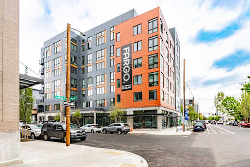 A street view of a building with the name "Forsberg" on it.