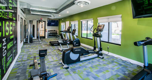 a gym with a bunch of chairs in it
