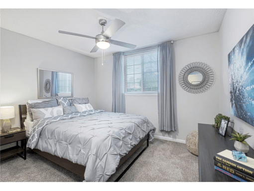 Springdale Glen apartments in Clarkston Georgia photo of bedroom with ceiling fan