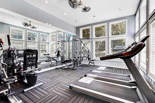 One K apartments in Atlanta Georgia- A well-equipped gym with treadmills, weights, and exercise machines.