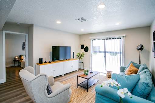 Spacious apartment living room with natural light at Haven at Lone Mountain in Las Vegas, NV