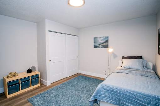 Bright bedroom with closet space at Haven at Lone Mountain apartments in Las Vegas, NV