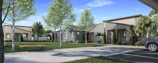 a row of houses with a sidewalk and a car parked in front