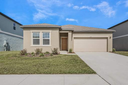 A house with a brown garage door and a brown front door.