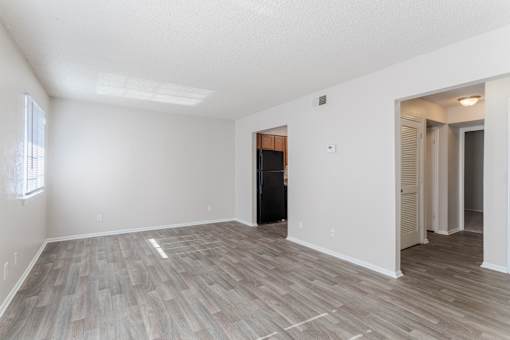 Apartments in Antioch, TN 37013 for Rent – Hickory Lake - A room with a wooden floor and white walls.