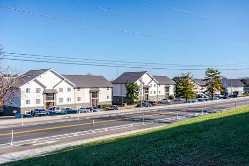 Pet-Friendly Apartments in Antioch, TN– Hickory Lake – A row of houses with cars parked in front.