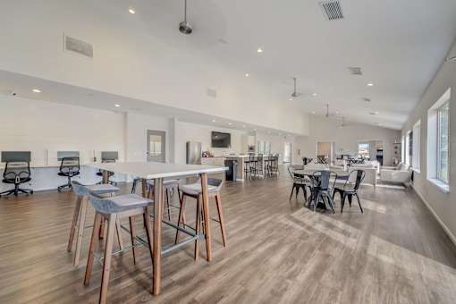 Resident kitchen and dining area at Hinton Heights Apartments in Cottage Grove, MN, designed for gatherings in a pet-friendly apartment community.