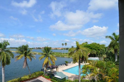 Horizons North Apartments near Miami Gardens Florida photo of a view of a pool and a body of water from a balcony
