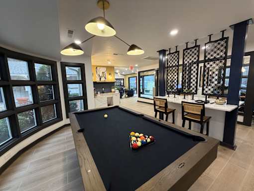 Billiards table in community clubhouse at Remington Place Apartments in Raleigh, NC