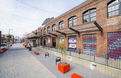 A brick building with a sign that says "World Peace" on it.