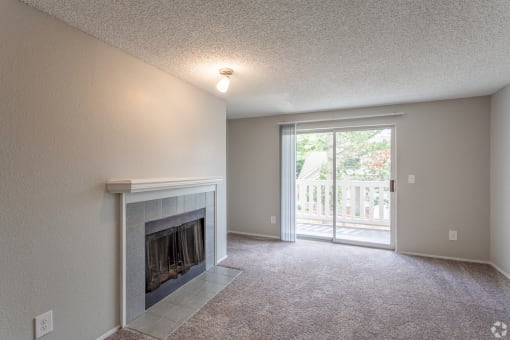 Living room with wood burning fireplace