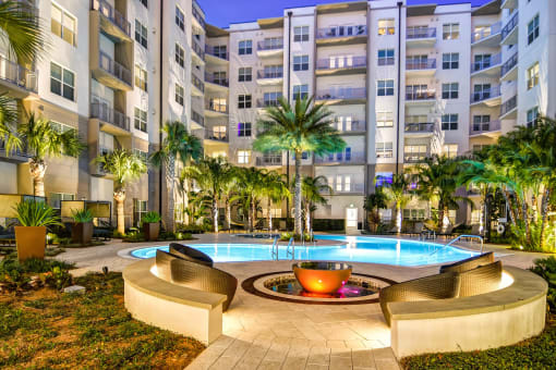 Juno at Winter Park apartments in Winter Park Florida photo of resort-style pool with firepit features