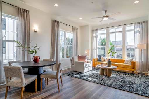 Luxury Atlanta, GA Homes – LaFrance Square – A modern dining room with a round table and chairs.