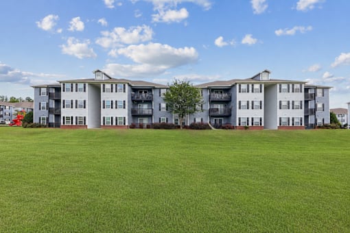 Apartment homes at Lancaster Place Apartments in Calera, Alabama surrounded by open green space in Shelby County near Birmingham.