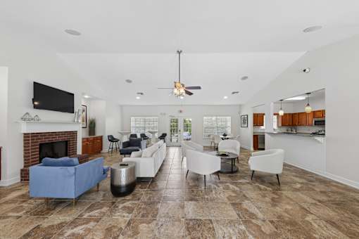 Spacious resident clubhouse at Lancaster Place Apartments in Calera, Alabama featuring comfortable seating, gathering spaces, and modern community amenities.