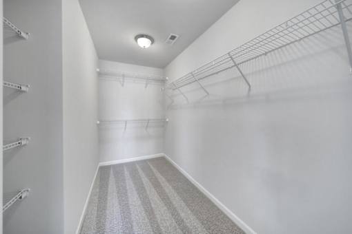 Spacious walk-in closet in pet-friendly townhome in Indian Trail, NC