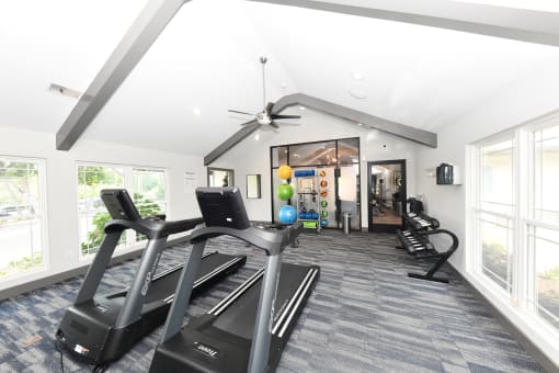 the preserve at ballantyne commons fitness room with cardio equipment and windows