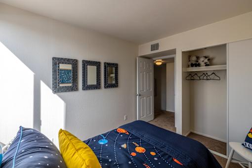 Pet-Friendly Apartments In Tucson, AZ – Midtown on Seneca - Photo of Bedroom and large closet